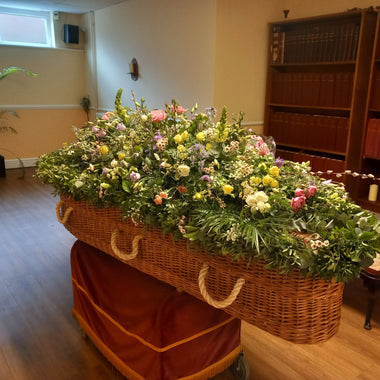 Country style full casket spray with garland