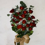 Tied red rose spray