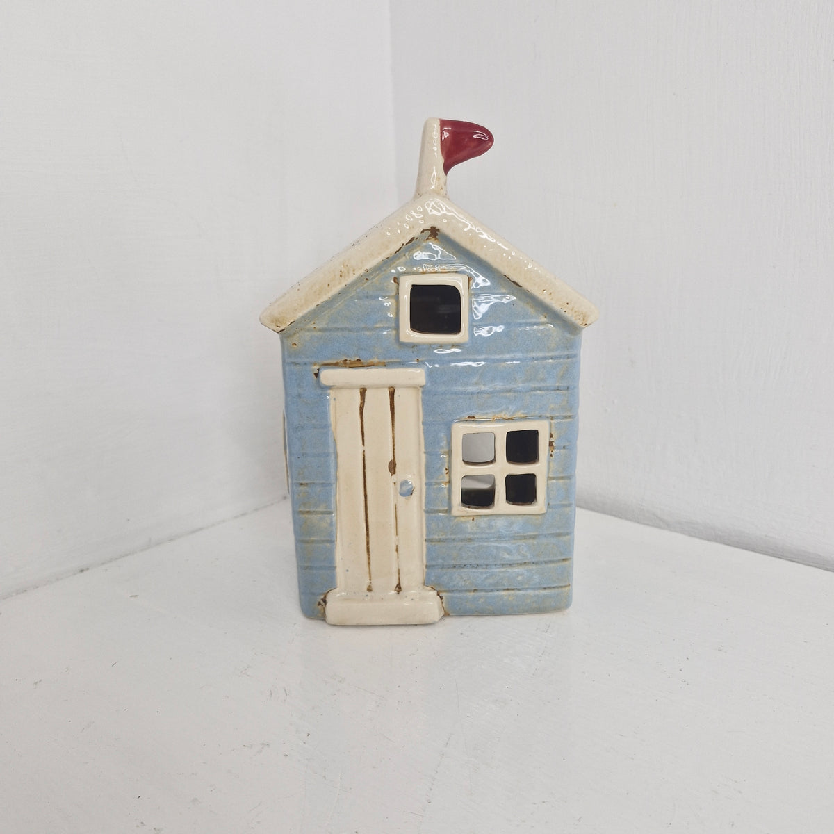 Beach hut tea light holder