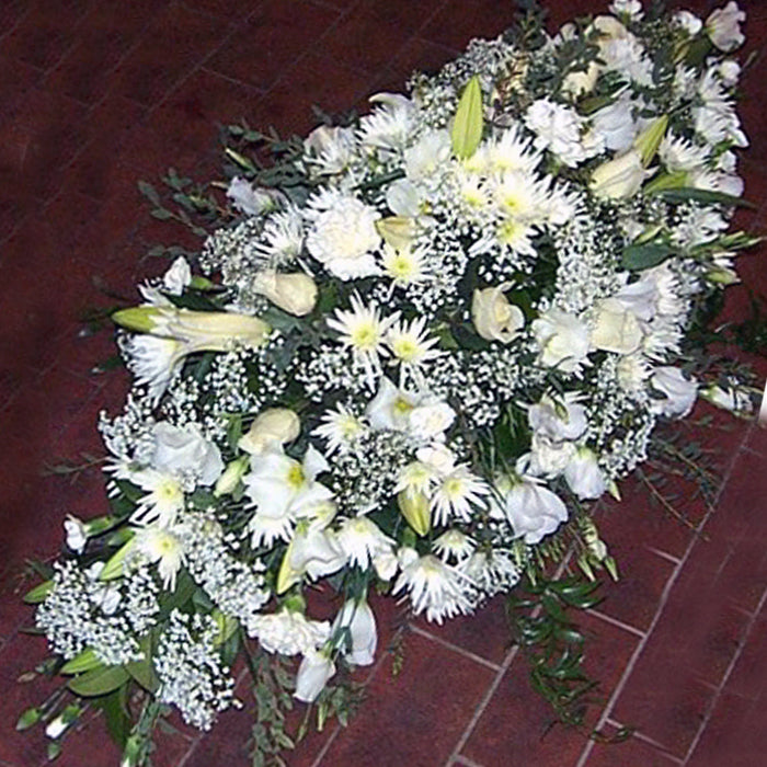 An all-white double-ended spray flower arrangement