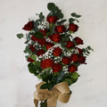 Tied red rose spray